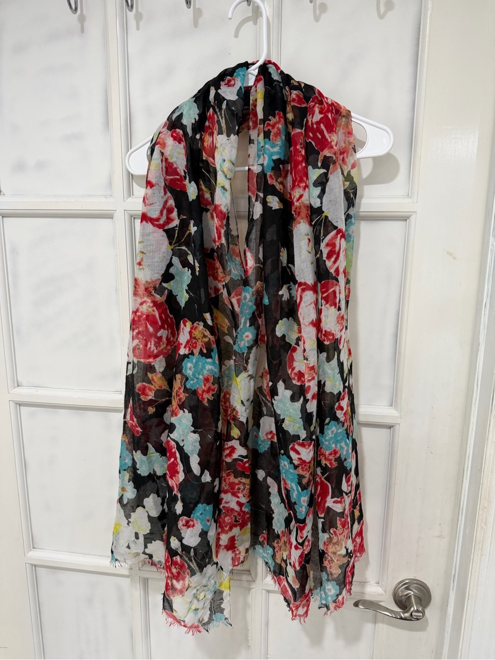 Floral lightweight top with brand label visible